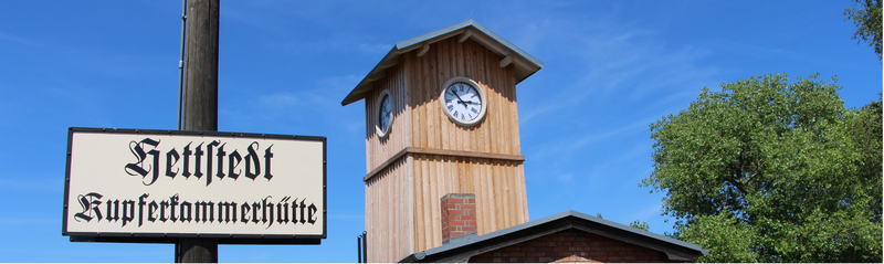 Uhrenturm und Schild Hettstedt Kupferkammerhütte